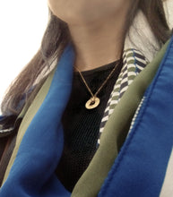Load image into Gallery viewer, by Yuki Assiter  Pond Ripple inspired disc and a diamond cut ball chain necklace. Available in sterling silver and yellow gold.  Disk: approx.18mm diameter x 2.5mm height Chain: 1.2mm thickness, approx. 460mm length