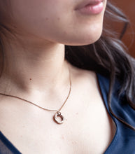 Load image into Gallery viewer, by Yuki Assiter  Small Pond Ripple inspired disc with a diamond cut ball chain necklace in rose gold.  This ‘Small’ Pond Ripples Disk is slightly smaller than ‘Pond Ripple’ disk necklace. The small disk looks more delicate and still has a lot of fine lines and details. The pendant top is attached on a diamond cut ball chain with an adjuster chain.  Disk: approx. 15mm diameter x 2.5mm height. Diamond cut ball chain: 1mm thickness, adjustable length: approx. 400- 430mm.